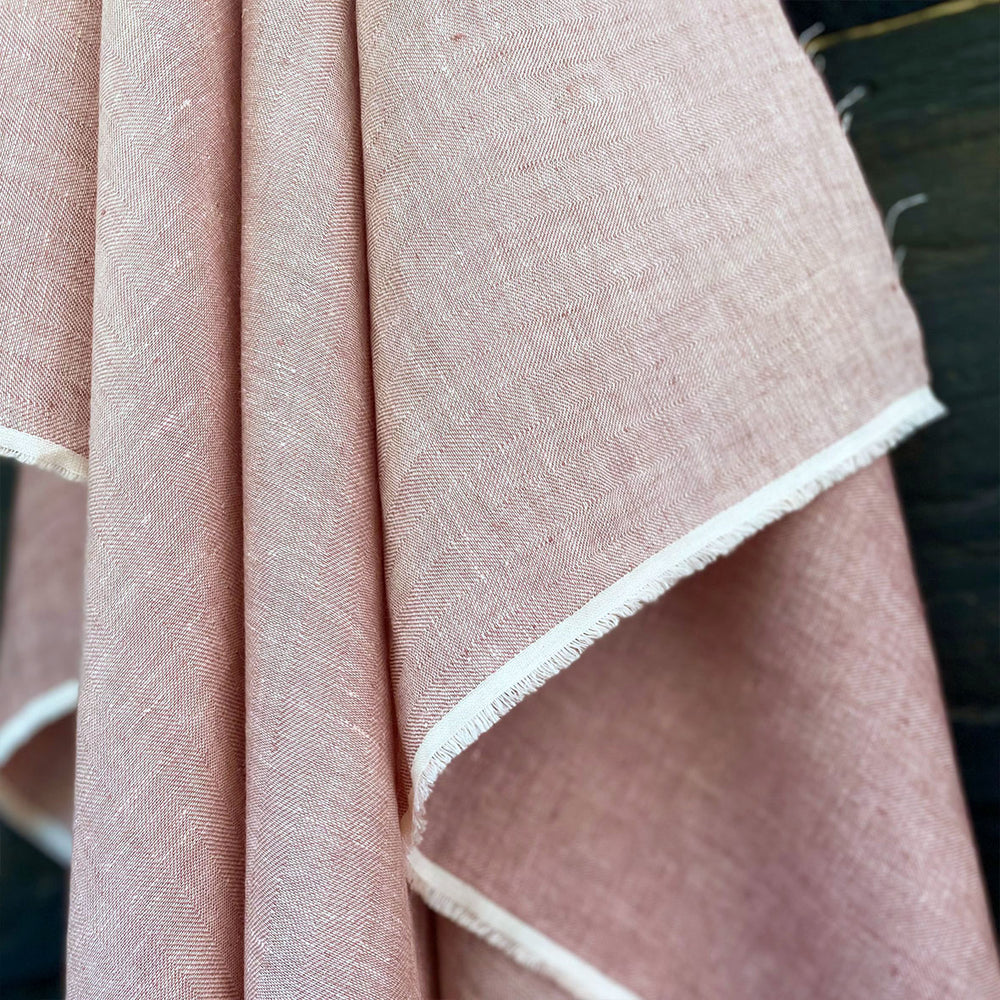 soft washed pale pink coloured linen herringbone weave draping