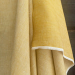 soft washed yellow coloured linen herringbone weave draping