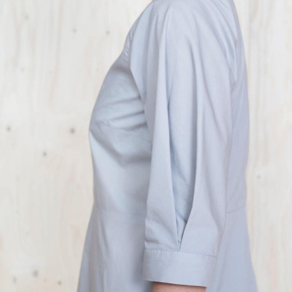 the assembly line shirt dress Our Shirt dress features a slight A-line silhouette and is designed to end at mid-calf length. Comes with a regular collar, a front button placket and two different cuff sleeves to choose