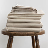 pile of organic cotton fabrics folded