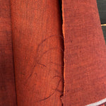 soft washed orange linen herringbone weave draping fabric