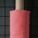 bright pink coloured and washed european linen fabric