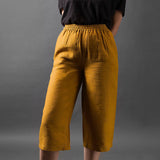 mustard yellow coloured and washed european linen fabric short trousers cullottes