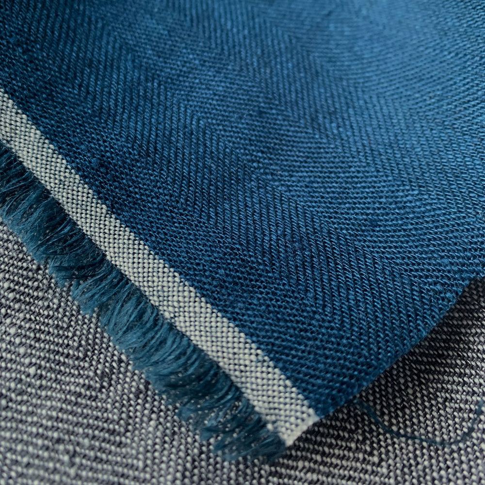 close up blue colour linen herringbone weave fabric