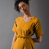mustard yellow or orange coloured and washed european linen fabric tie v neck dress