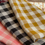 pile of fabric linen gingham colours