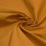 plain wide crisp cotton fabric in ochre yellow