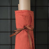 pink orange coloured and washed european linen fabric 
