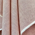 soft washed pale pink coloured linen herringbone weave draping