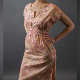 a dress made of pink printed light weight drapey cotton lawn fabric