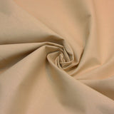 plain wide cotton fabric in tan