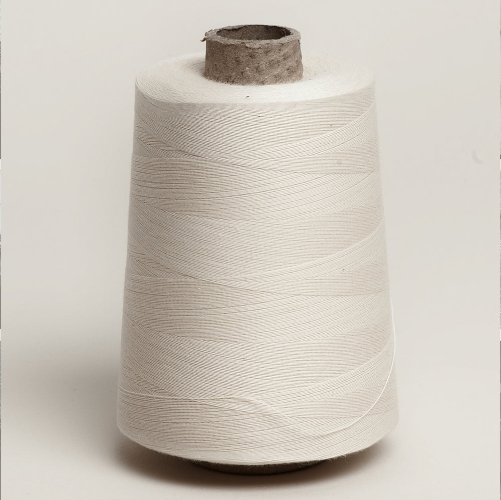 Unbleached Cotton Overlocker Spool on Cardboard Cone
